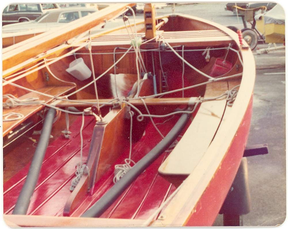 thistle class wooden sailaboat